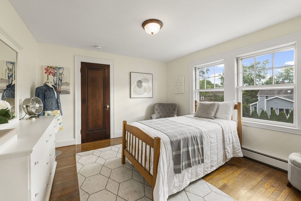 1 Auburndale Road Marblehead, MA 01945 - Photo 16 of 29 a bedroom with a bed and a large window with the outer view