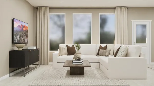 a living room with furniture and a lamp