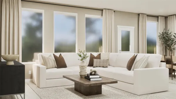 a living room with furniture and a large mirror