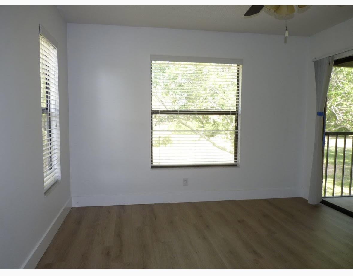 3130 Millwood Terrace, Unit 2120 Boca Raton, FL 33431 - Photo 11 of 15 a view of an empty room and window