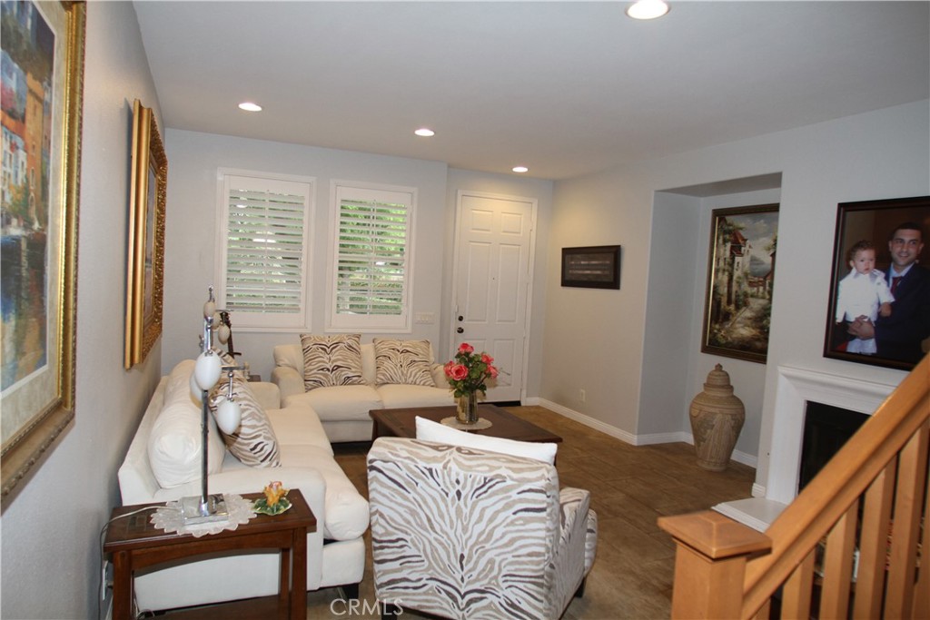 2660 West Madison Circle Anaheim, CA 92801 - Photo 11 of 52 a living room with furniture and a window