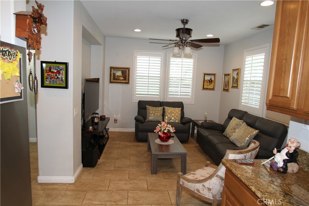 2660 West Madison Circle Anaheim, CA 92801 - Photo 16 of 52 a living room with furniture and a window