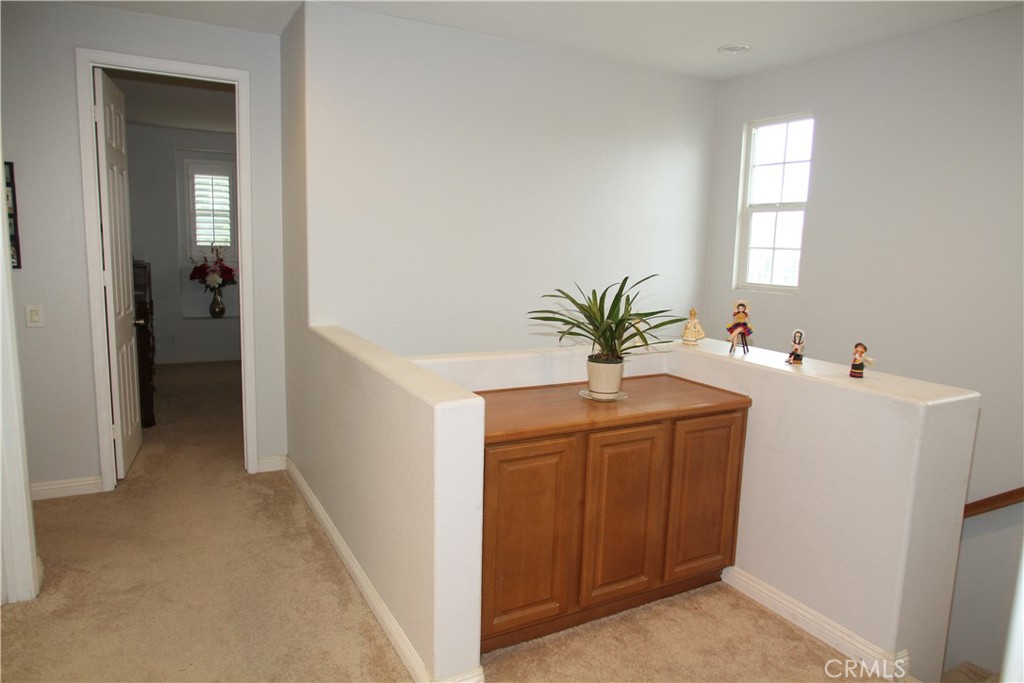 2660 West Madison Circle Anaheim, CA 92801 - Photo 23 of 52 a bathroom with a sink a mirror and a potted plant