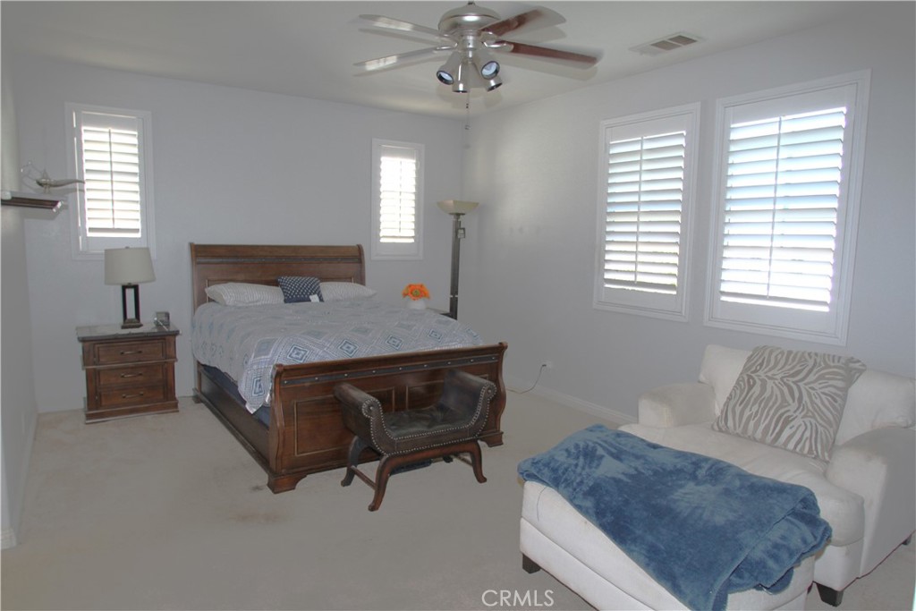2660 West Madison Circle Anaheim, CA 92801 - Photo 25 of 52 a bedroom with a bed and window