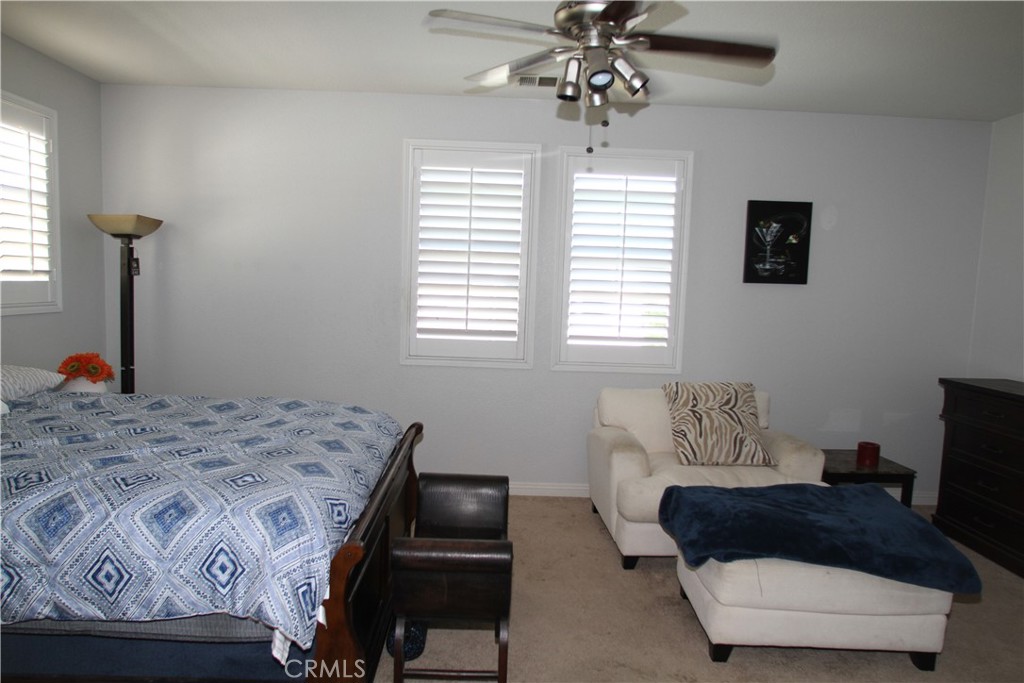 2660 West Madison Circle Anaheim, CA 92801 - Photo 27 of 52 a bedroom with a bed and a window