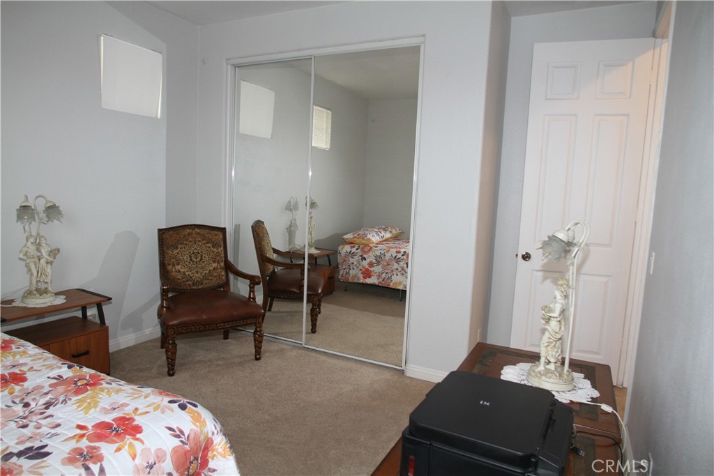 2660 West Madison Circle Anaheim, CA 92801 - Photo 38 of 52 a bedroom with bed and a window