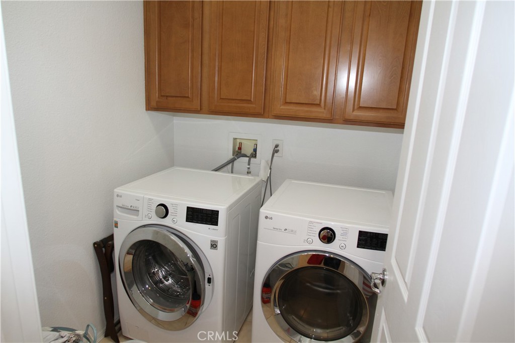 2660 West Madison Circle Anaheim, CA 92801 - Photo 39 of 52 a utility room with dryer and washer