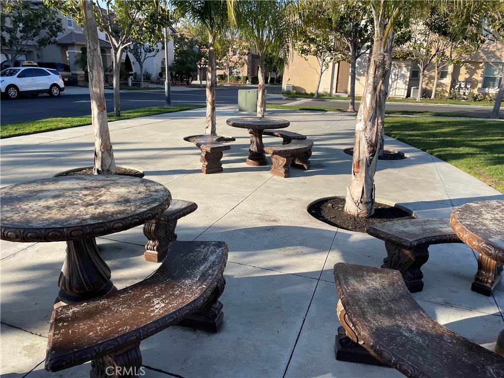 2660 West Madison Circle Anaheim, CA 92801 - Photo 50 of 52 a view of a swimming pool with sitting area