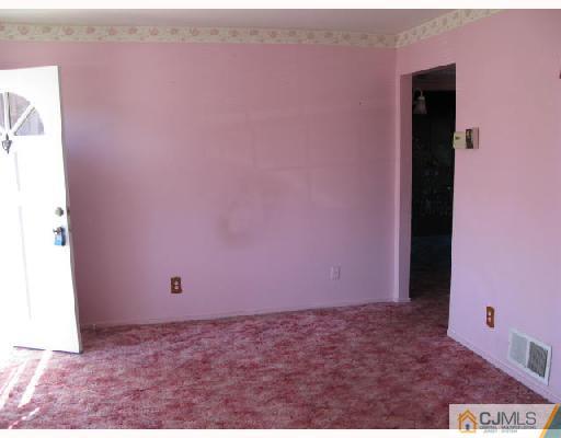 21 Piedmont Road Edison, NJ 08817 - Photo 3 of 6 a view of an empty room