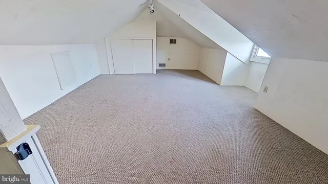 a view of a room with an entryway