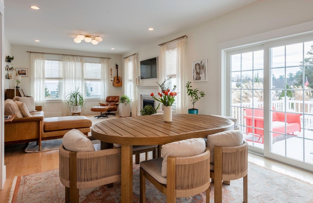 5 John West Road Exeter, NH 03833 - Photo 8 of 33 a view of a dining room with furniture window and outside view