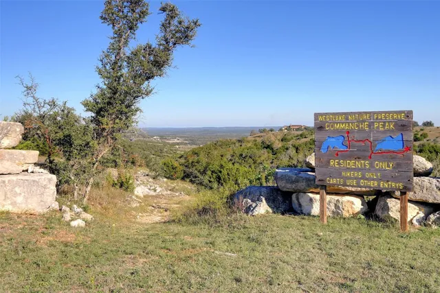 a view of a swimming pool with an ocean view