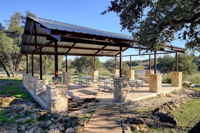 an outdoor space with wooden fence