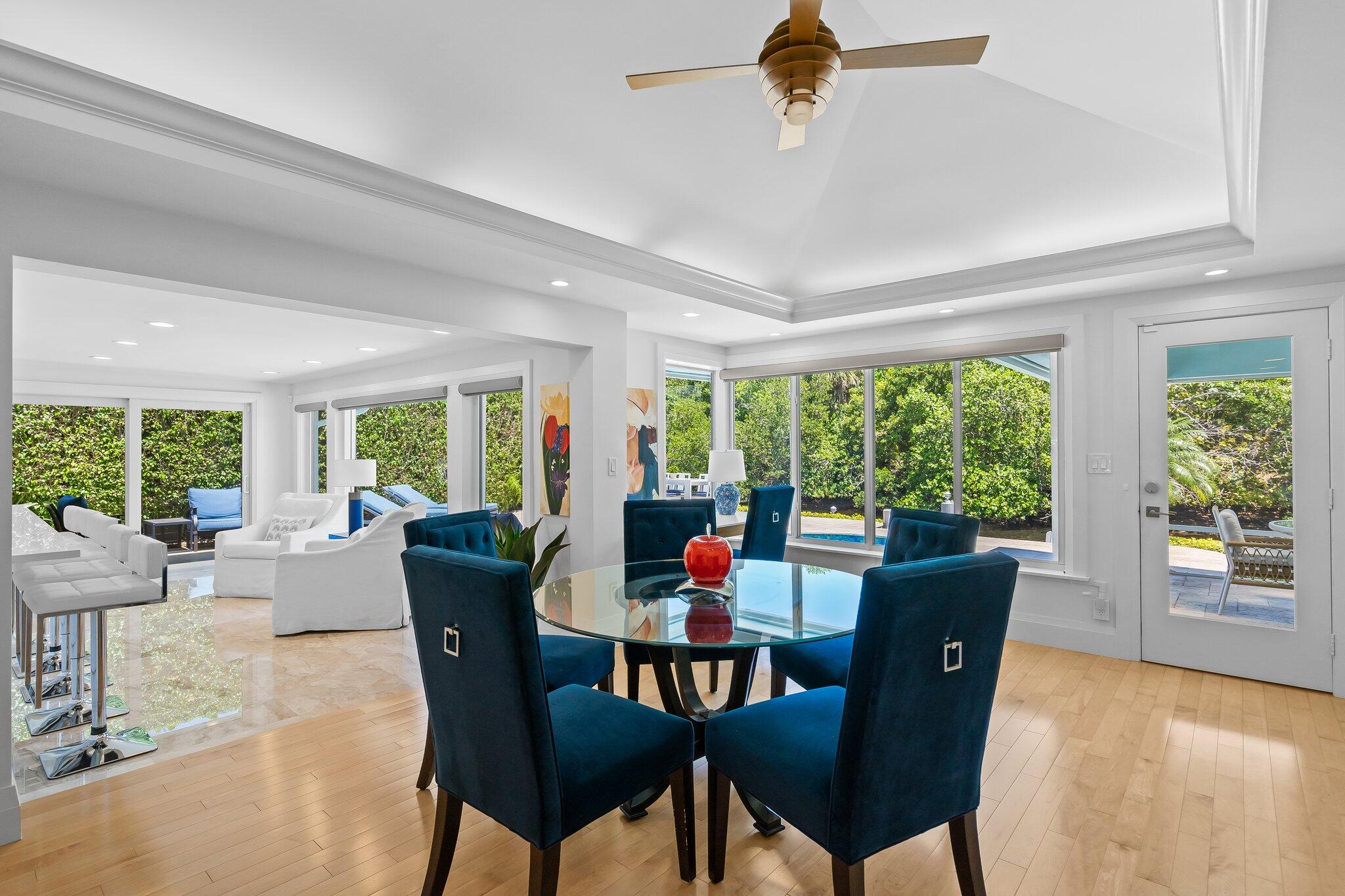 1090 Cypress Way Boca Raton, FL 33486 - Photo 17 of 40 a view of a dining room with furniture window and outside view