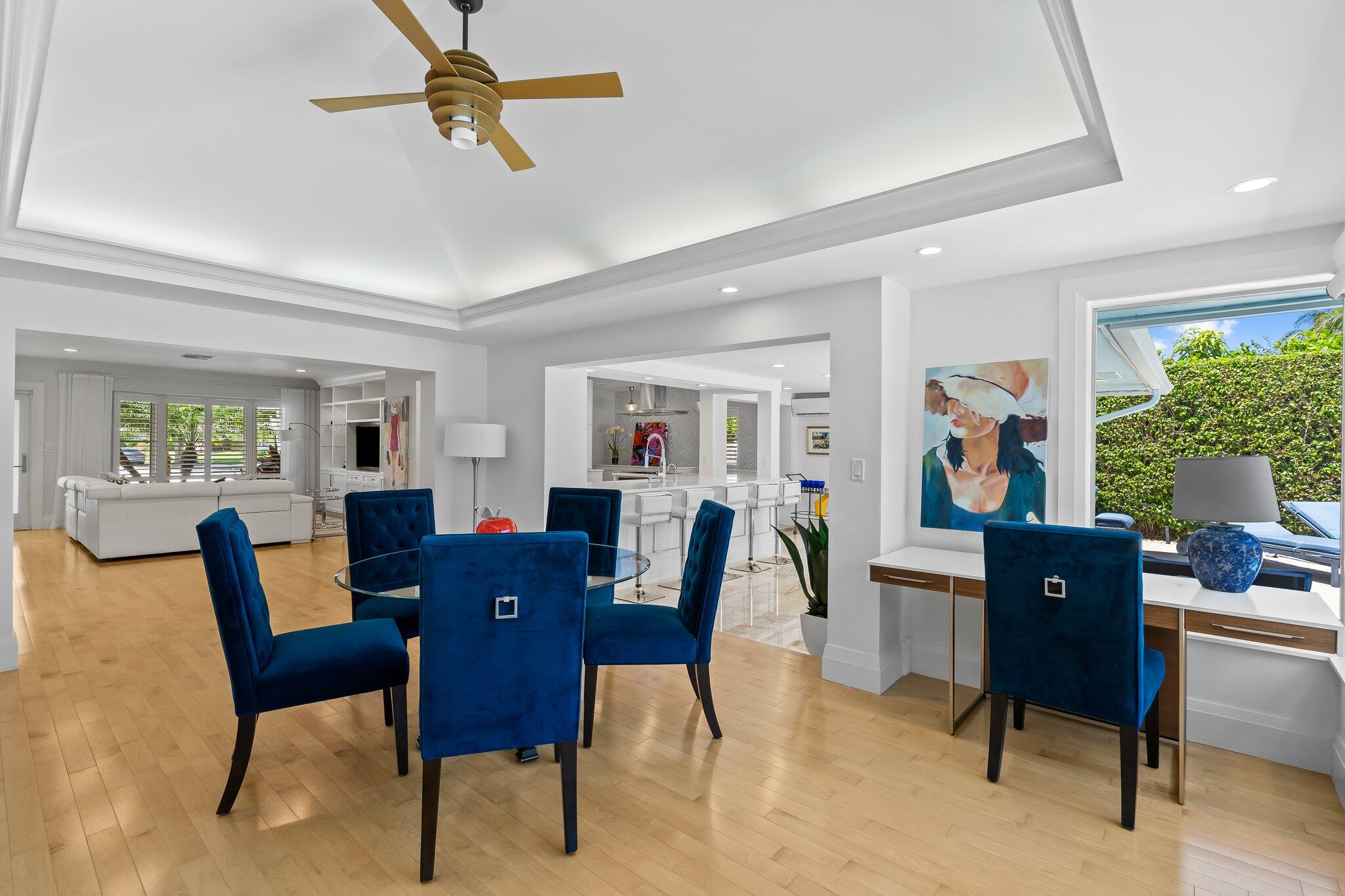 1090 Cypress Way Boca Raton, FL 33486 - Photo 19 of 40 a view of a dining room with furniture