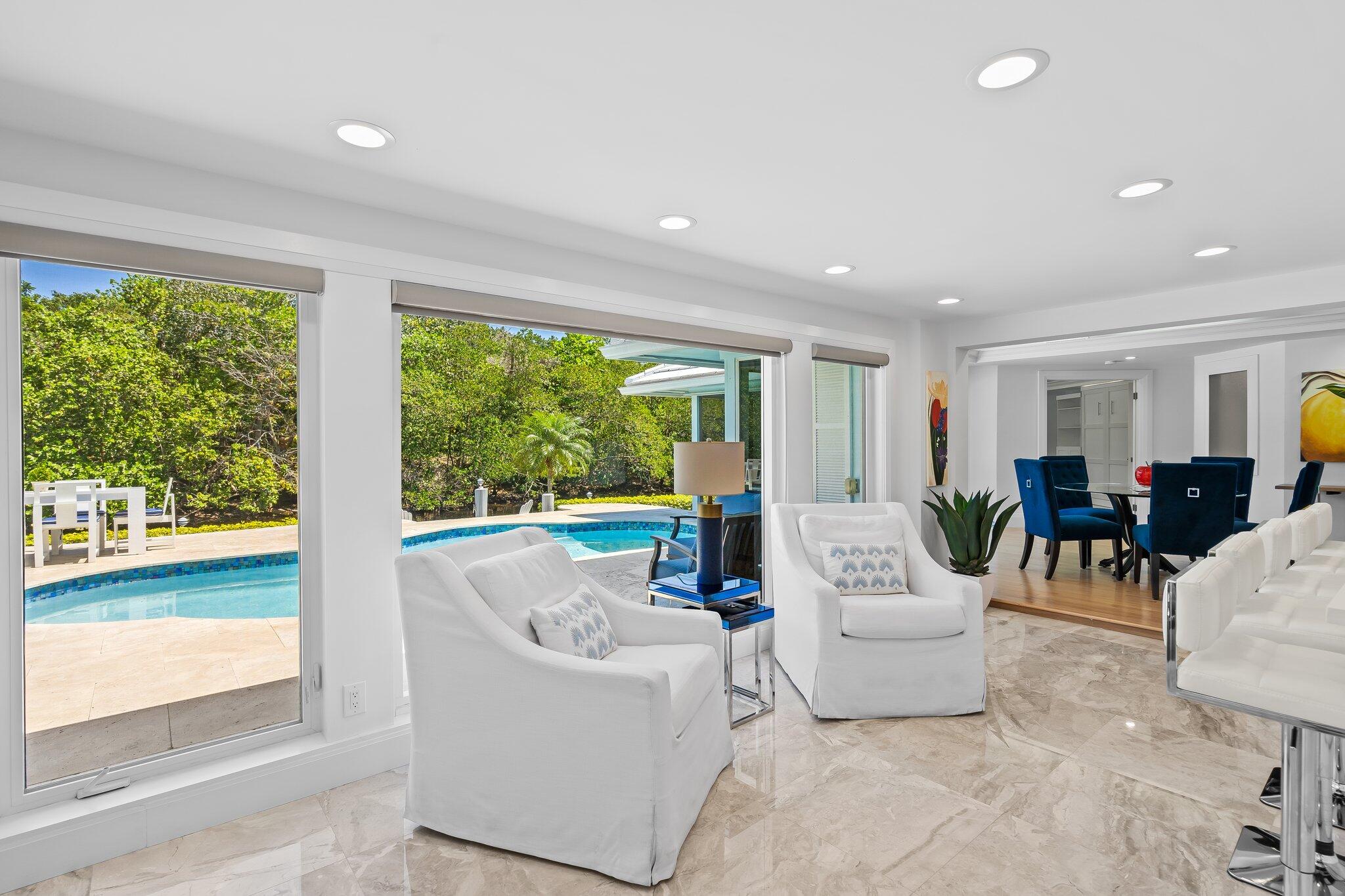 1090 Cypress Way Boca Raton, FL 33486 - Photo 21 of 40 a living room with furniture and a large window