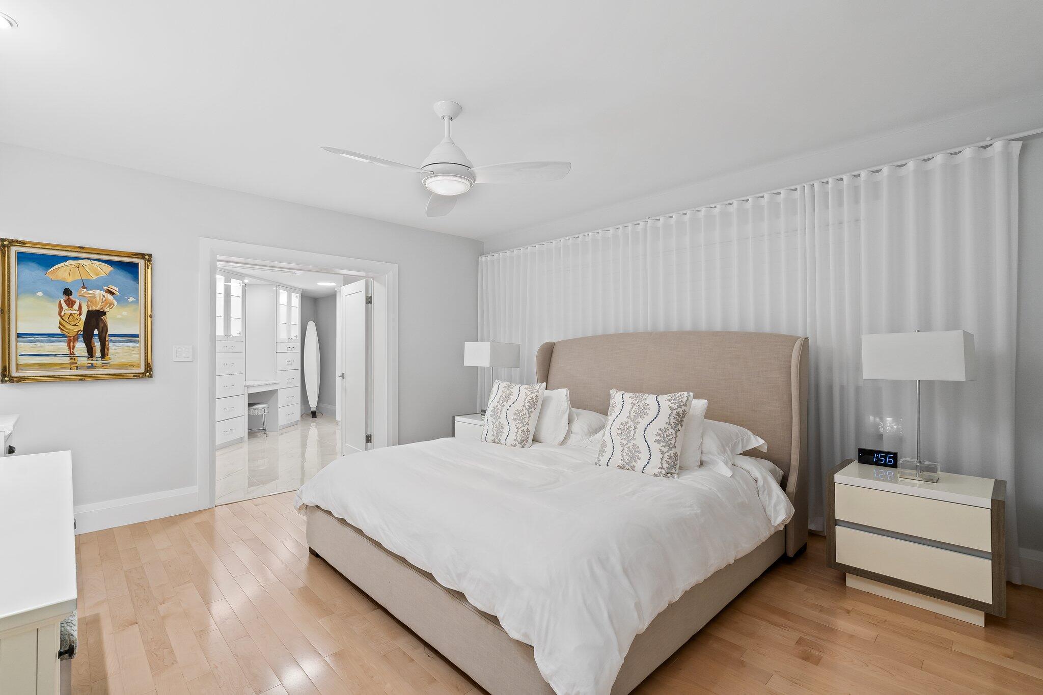 1090 Cypress Way Boca Raton, FL 33486 - Photo 23 of 40 a bedroom with a bed and a couch