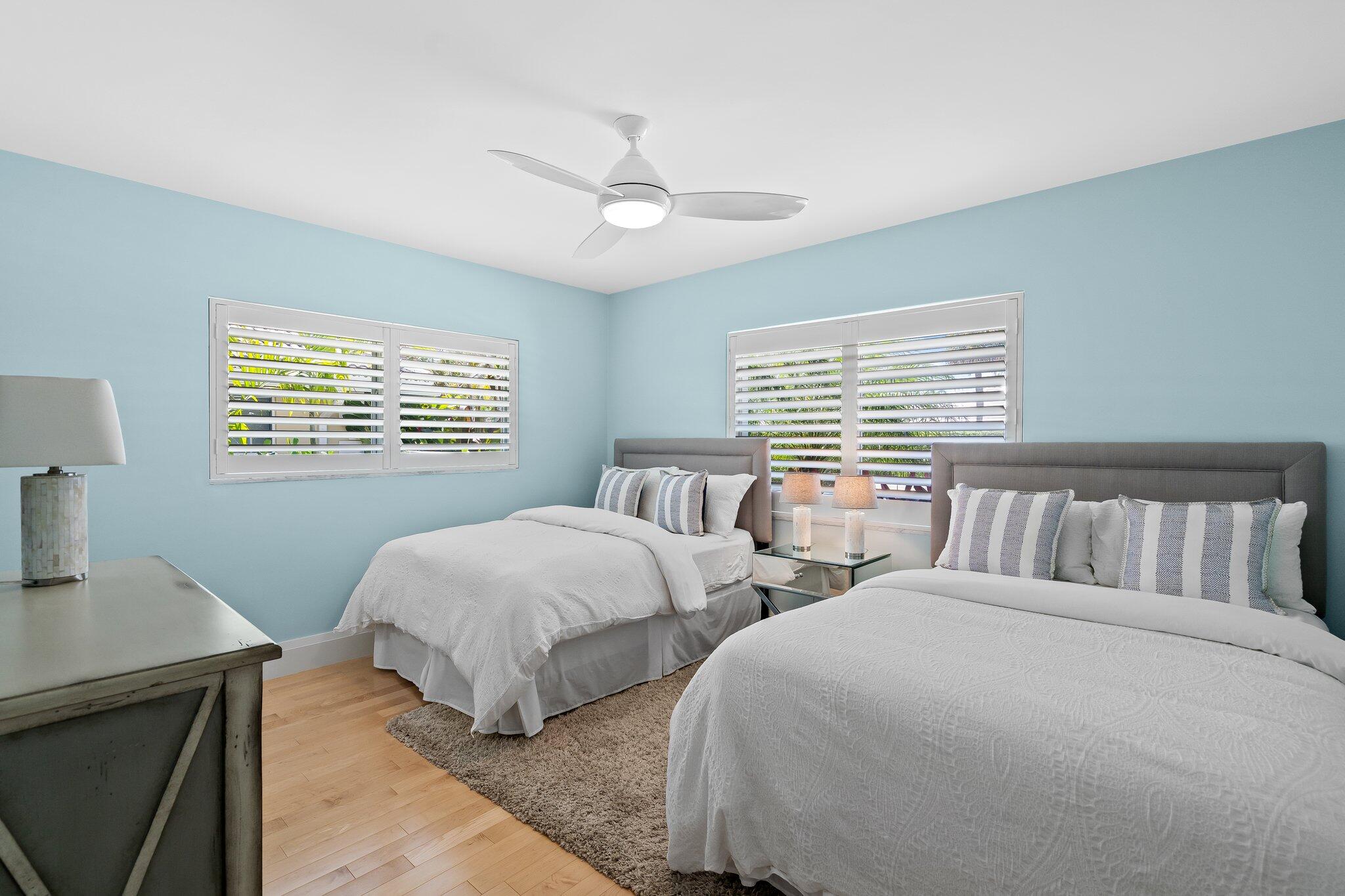 1090 Cypress Way Boca Raton, FL 33486 - Photo 24 of 40 a bedroom with two beds and a window