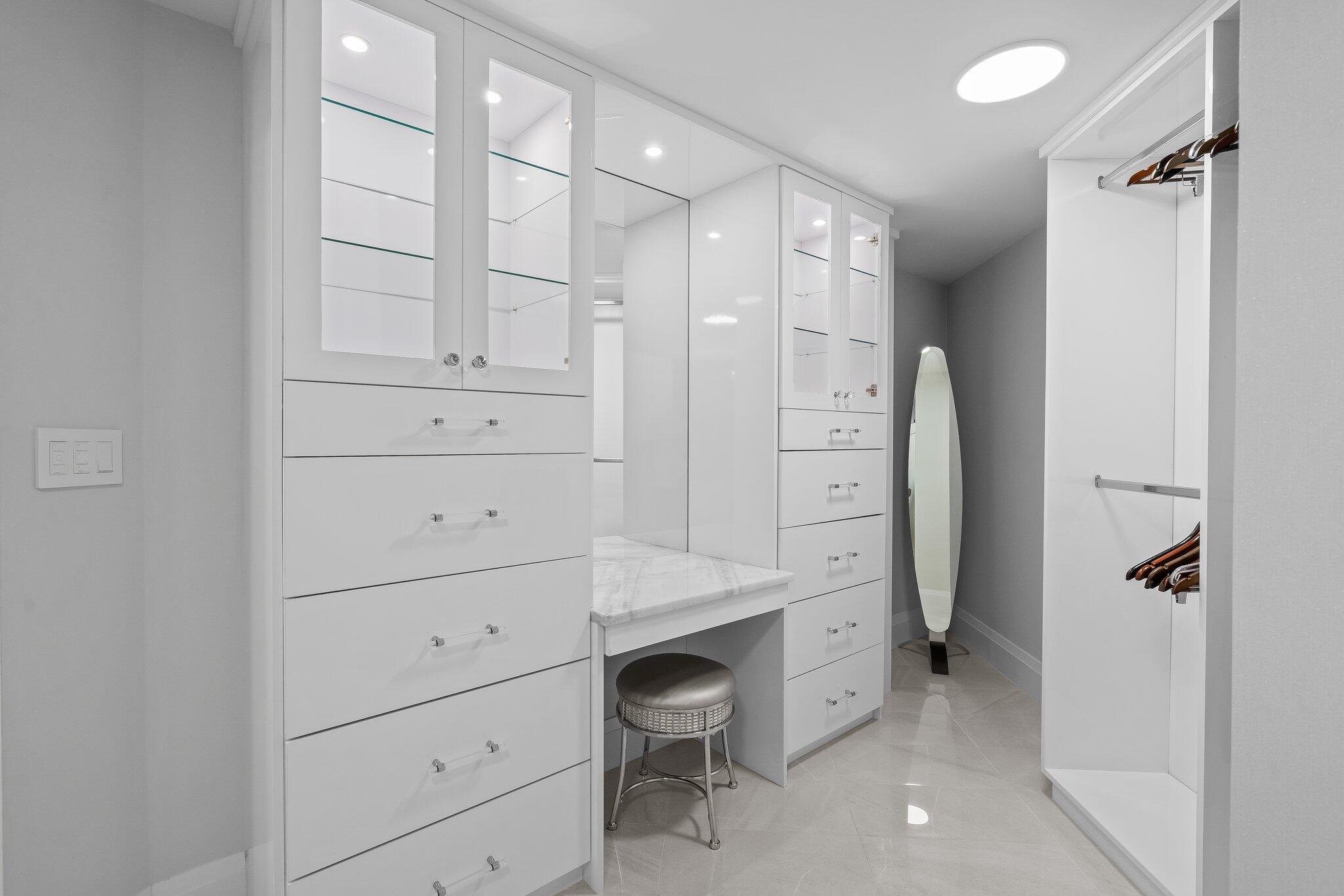1090 Cypress Way Boca Raton, FL 33486 - Photo 27 of 40 a bathroom with a double vanity sink a toilet and shower