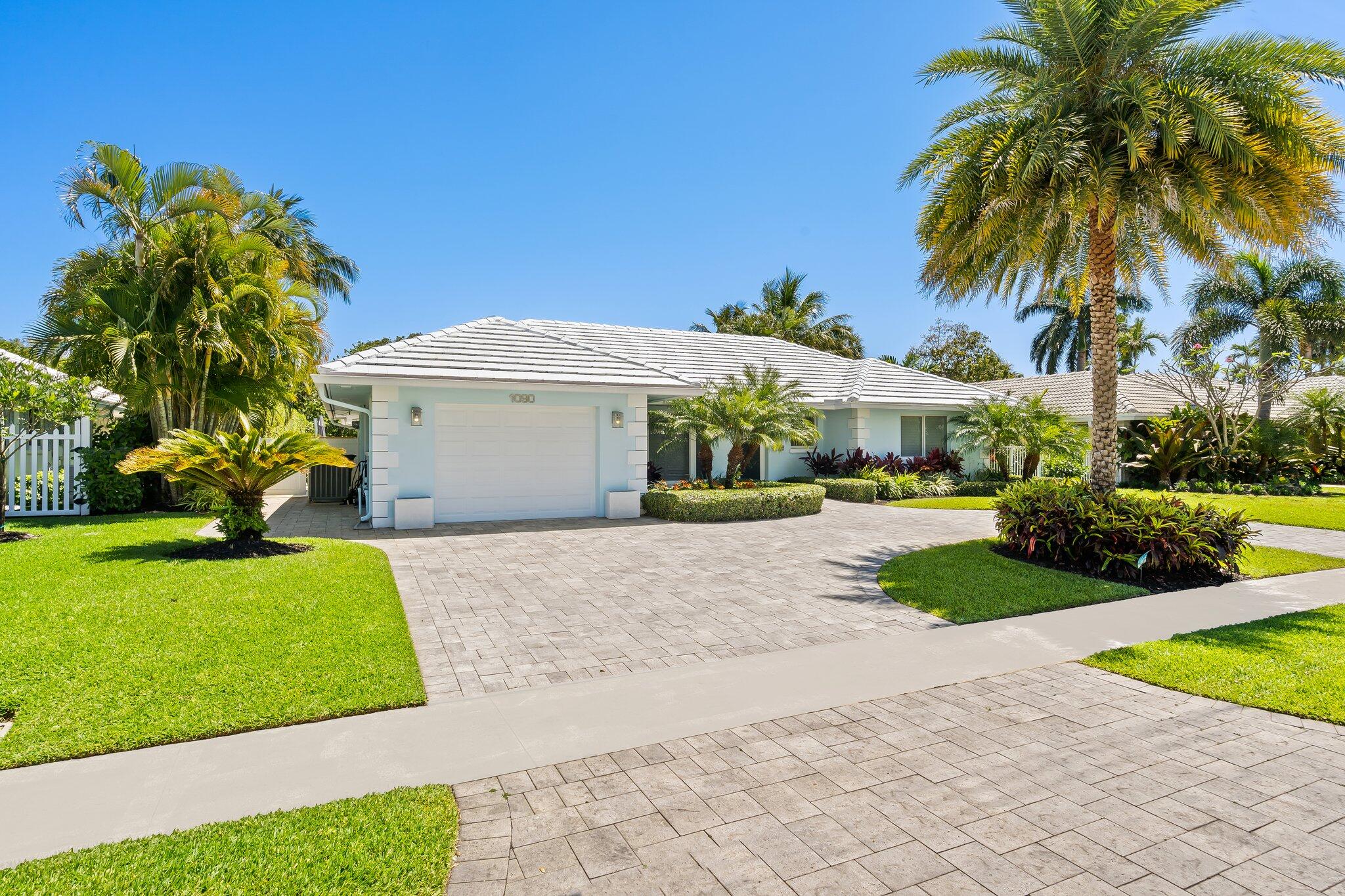 1090 Cypress Way Boca Raton, FL 33486 - Photo 39 of 40 a front view of a house with garden