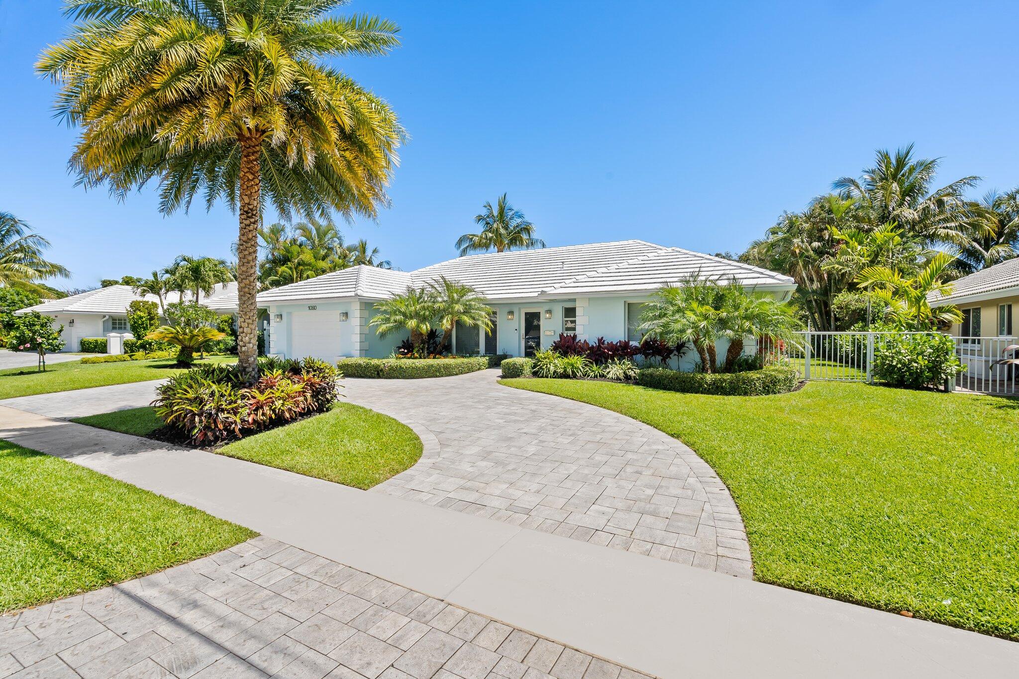 1090 Cypress Way Boca Raton, FL 33486 - Photo 40 of 40 a view of a house with a yard and potted plants