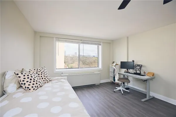 a workspace with furniture and a window