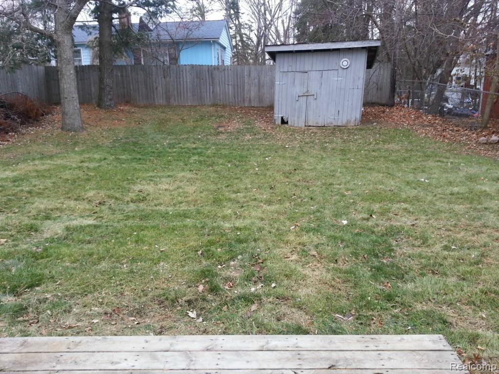 5969 Anglers Road Ortonville, MI 48462 - Photo 4 of 23 back yard shed.jpg