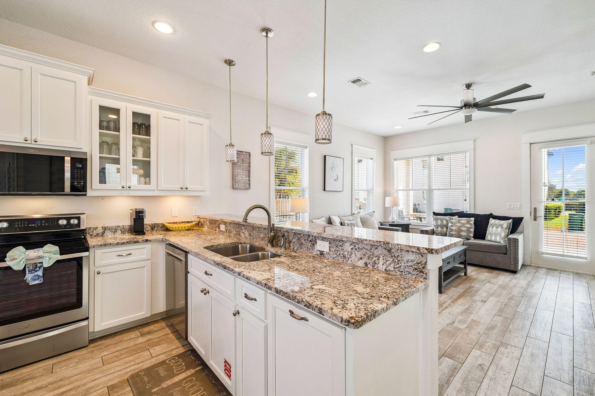 32 Moonlit Shores Lane Santa Rosa Beach, FL 32459 - Photo 12 of 48 a kitchen with a sink stove and cabinets