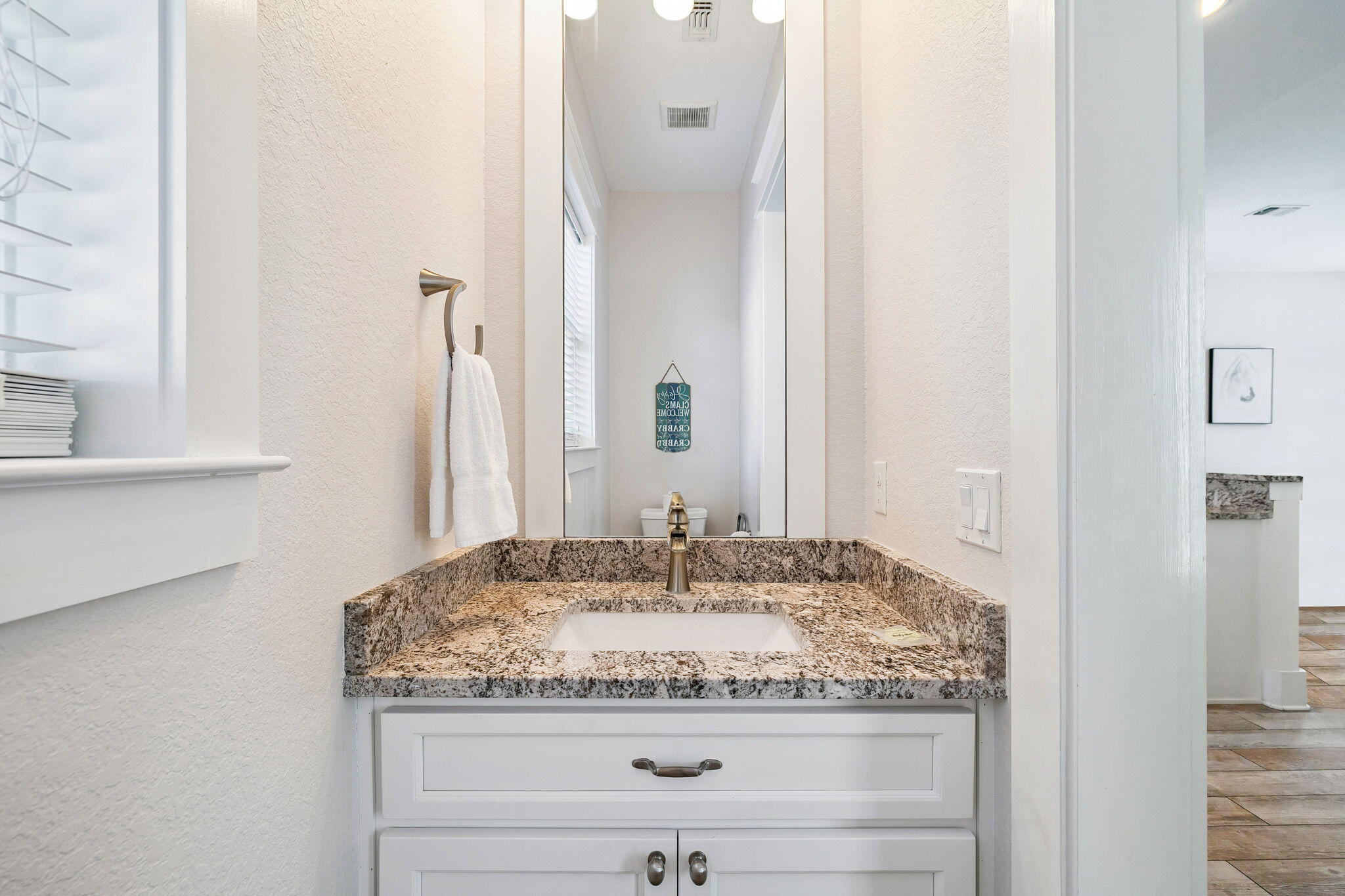 32 Moonlit Shores Lane Santa Rosa Beach, FL 32459 - Photo 17 of 48 a bathroom with a granite countertop sink and a mirror
