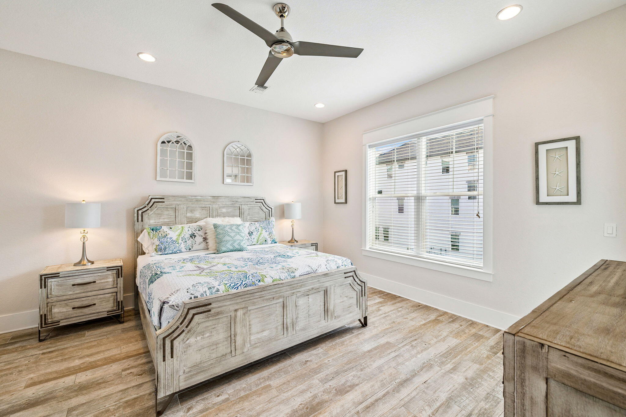 32 Moonlit Shores Lane Santa Rosa Beach, FL 32459 - Photo 18 of 48 a bedroom with a large bed and a window