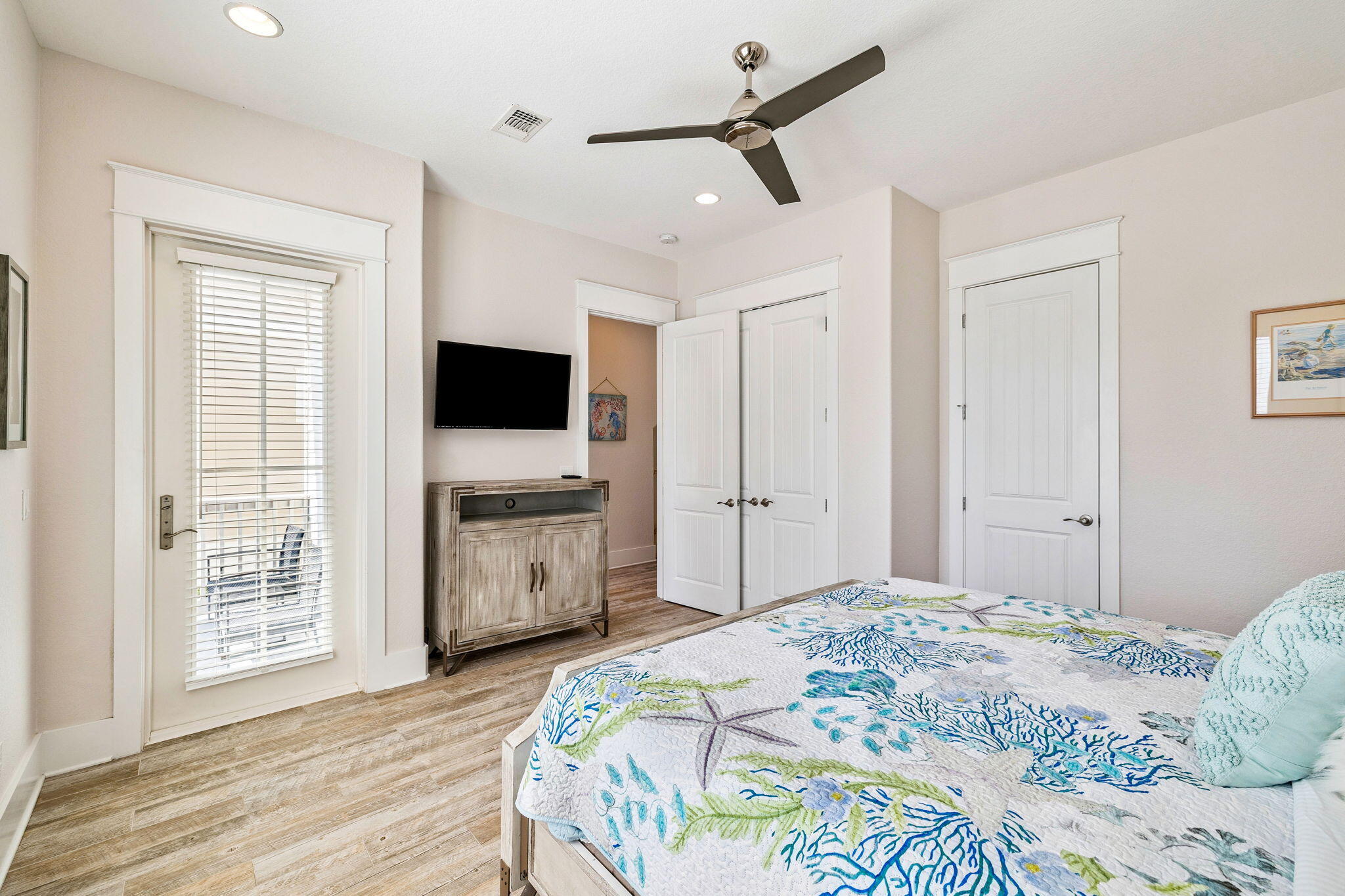 32 Moonlit Shores Lane Santa Rosa Beach, FL 32459 - Photo 20 of 48 a bedroom with a bed and a flat screen tv