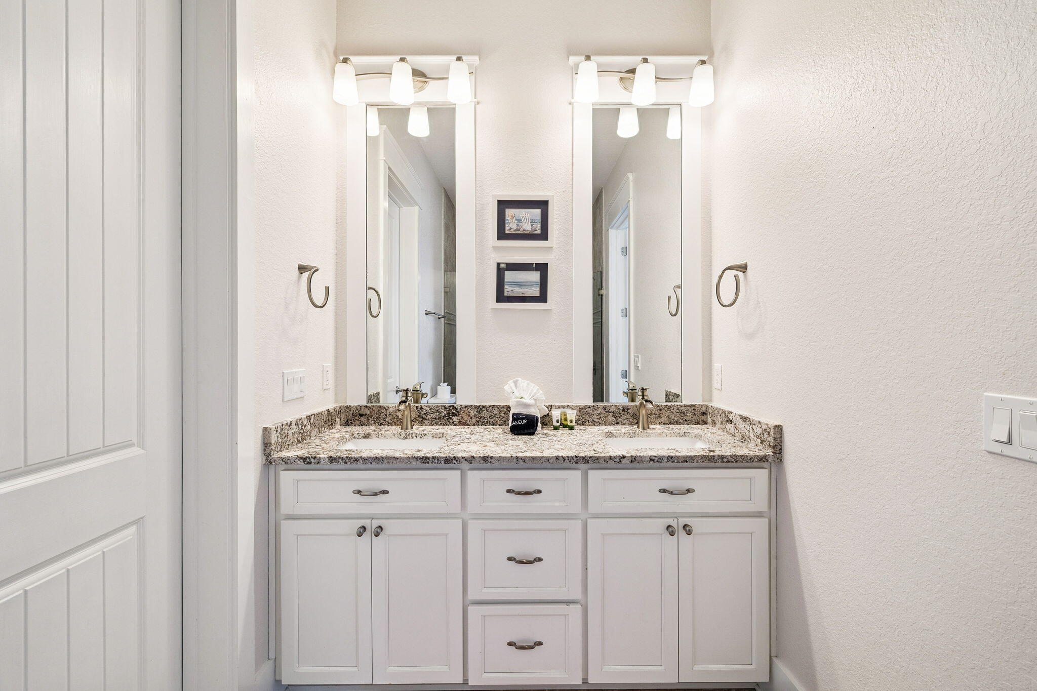 32 Moonlit Shores Lane Santa Rosa Beach, FL 32459 - Photo 22 of 48 a bathroom with a granite countertop sink and a mirror