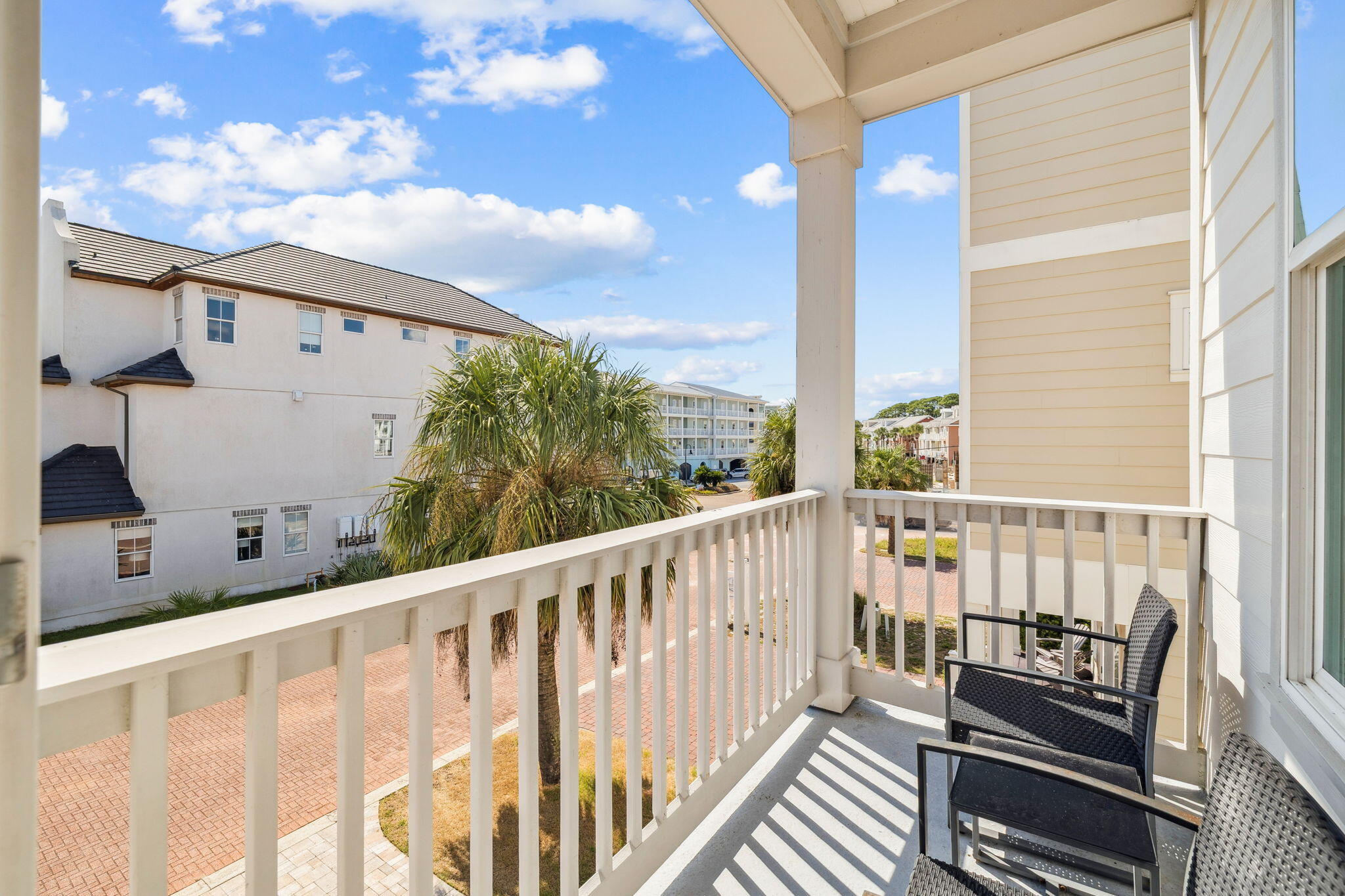 32 Moonlit Shores Lane Santa Rosa Beach, FL 32459 - Photo 24 of 48 a view of a balcony with wooden floor and fence