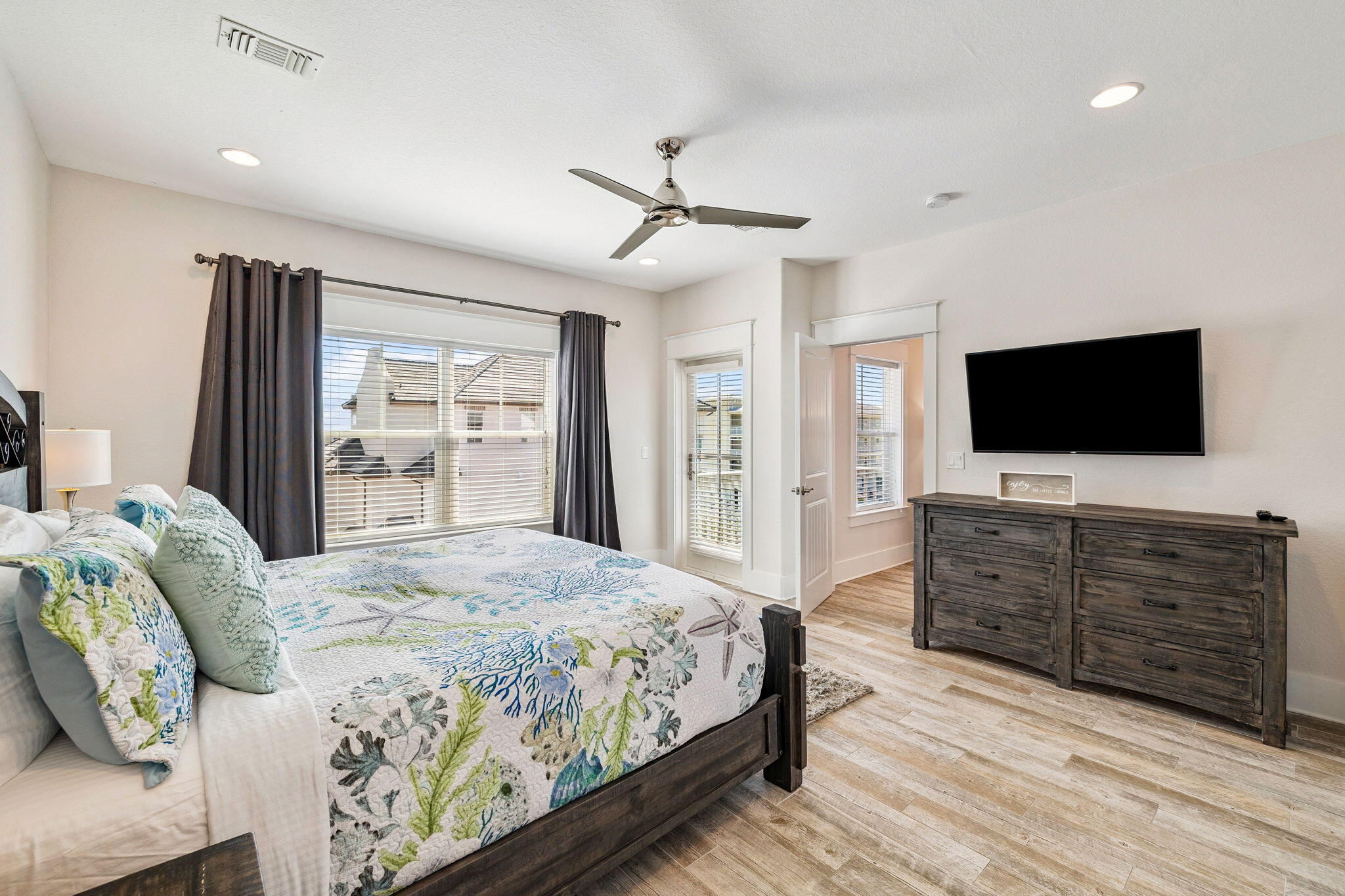 32 Moonlit Shores Lane Santa Rosa Beach, FL 32459 - Photo 32 of 48 a bedroom with a bed and a flat screen tv