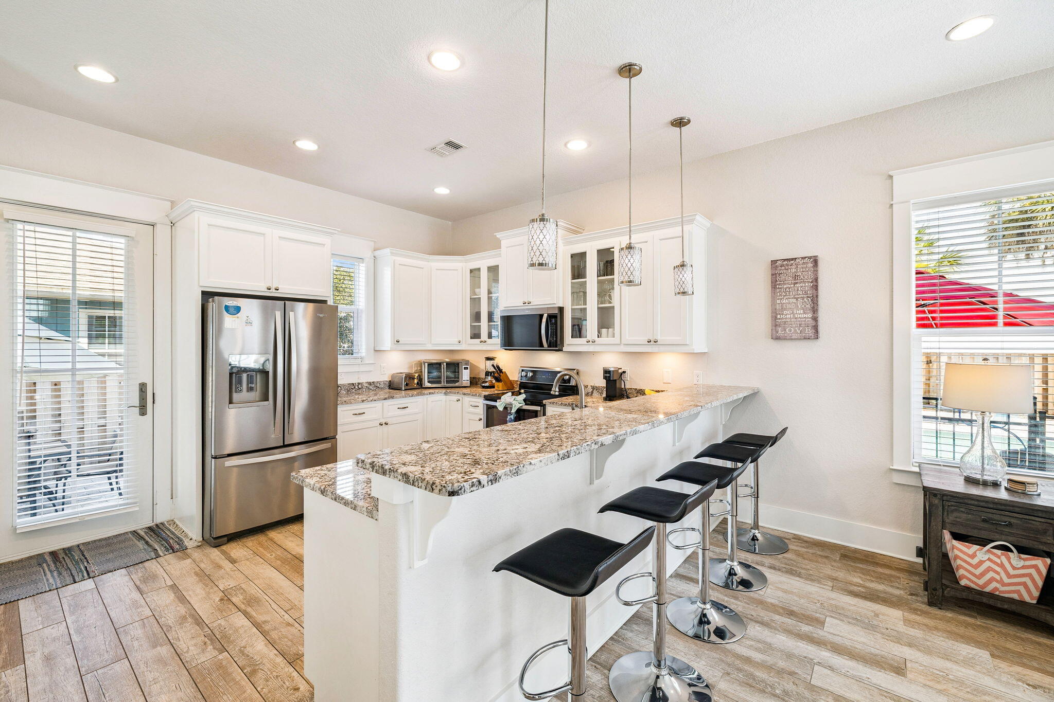 32 Moonlit Shores Lane Santa Rosa Beach, FL 32459 - Photo 10 of 48 a large kitchen with lots of counter space and refrigerator