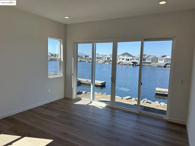 a spacious bathroom with a double vanity sink and a mirror