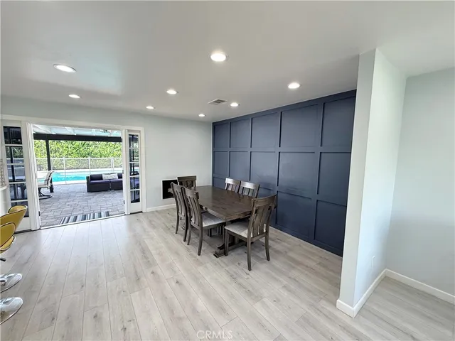 a workspace with furniture and wooden floor