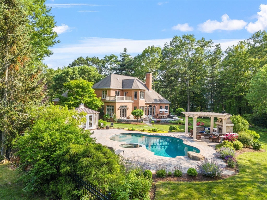98 Fox Run Road Bolton, MA 01740 - Photo 1 of 42 an aerial view of a house with swimming pool and garden view