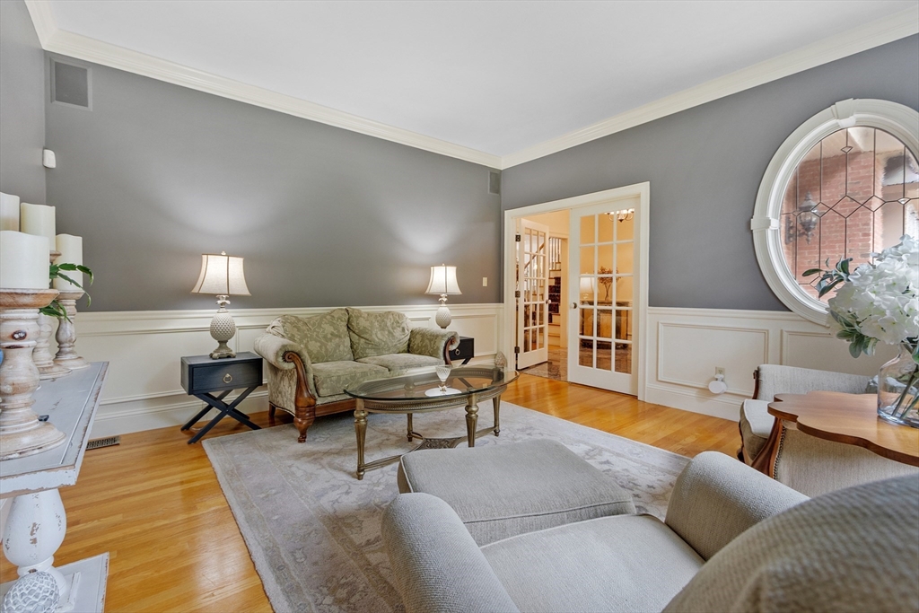 98 Fox Run Road Bolton, MA 01740 - Photo 12 of 42 a living room with furniture and a large mirror