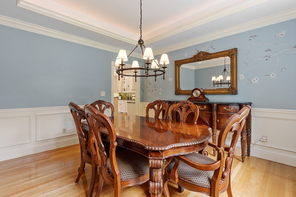 98 Fox Run Road Bolton, MA 01740 - Photo 14 of 42 a view of a dining room with furniture and wooden floor