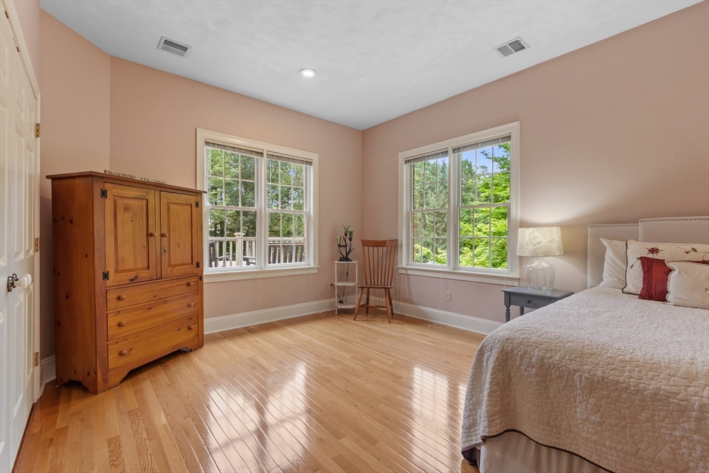 98 Fox Run Road Bolton, MA 01740 - Photo 21 of 42 a bedroom with a bed and a window
