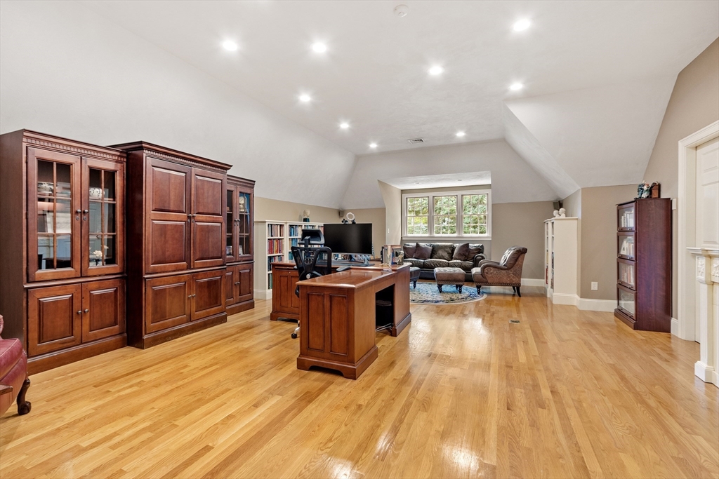 98 Fox Run Road Bolton, MA 01740 - Photo 25 of 42 a living room with furniture and a wooden floor