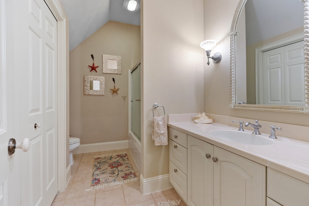 98 Fox Run Road Bolton, MA 01740 - Photo 27 of 42 a bathroom with a sink a toilet and shower