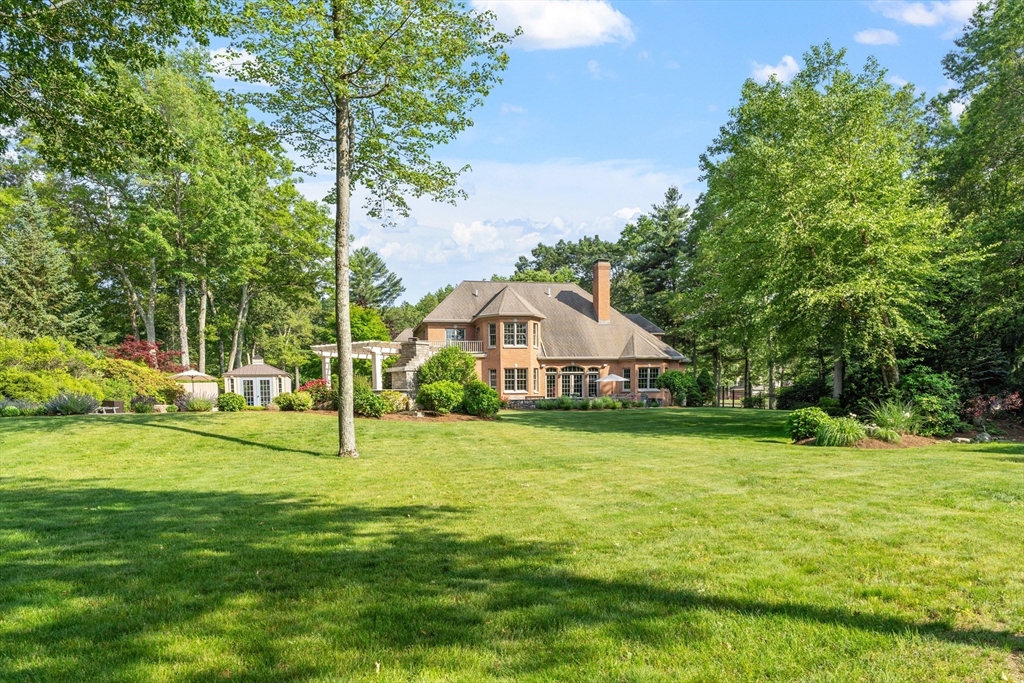 98 Fox Run Road Bolton, MA 01740 - Photo 36 of 42 a front view of a house with a yard