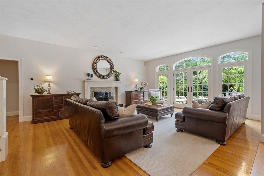 98 Fox Run Road Bolton, MA 01740 - Photo 8 of 42 a living room with furniture and a large window