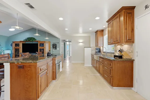 a view of a house with swimming pool