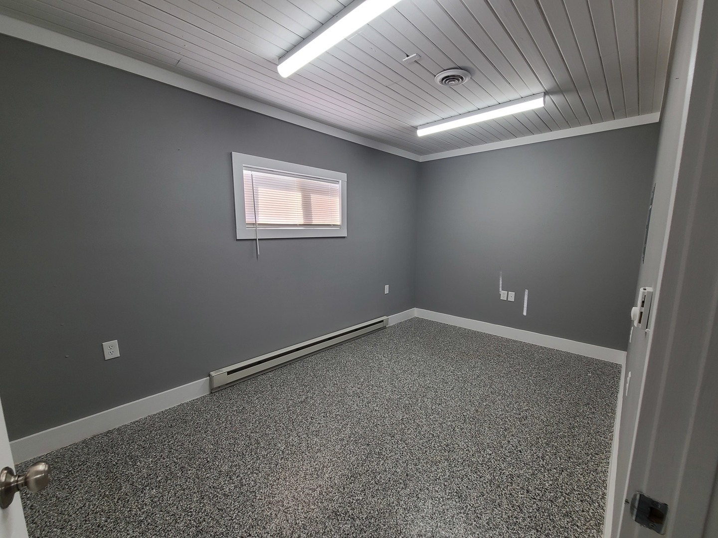 116 West South Street Franklin Grove, IL 61031 - Photo 18 of 21 an empty room with a workbench