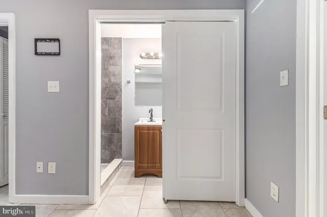 a view of a bathroom with a glass door