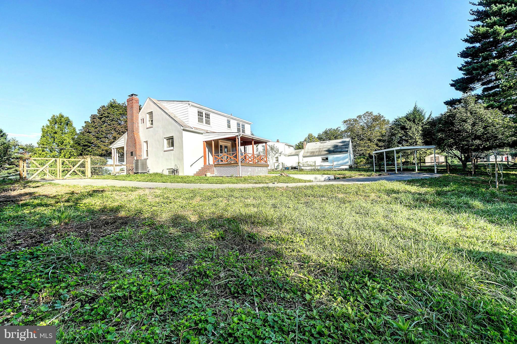 3023 Ridge Road Baltimore, MD 21244 - Photo 25 of 30 a view of a house with a yard