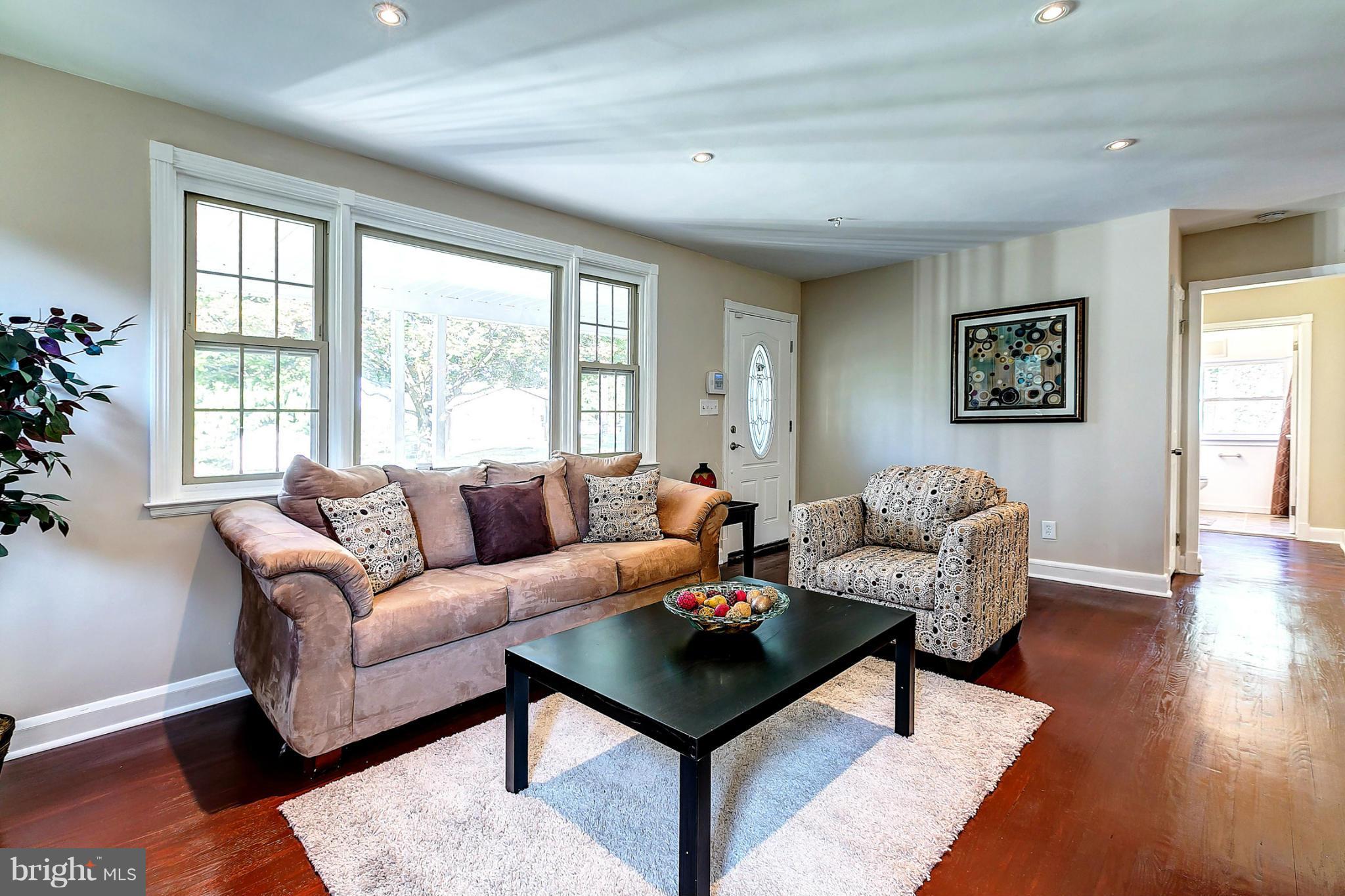 3023 Ridge Road Baltimore, MD 21244 - Photo 4 of 30 a living room with furniture and a window
